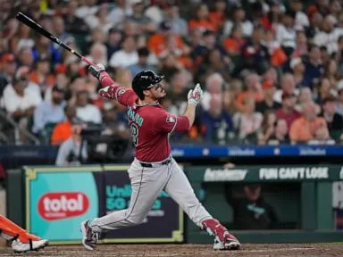 Nolan Arenado’s 2-run homer lifts the Diamondbacks past the Astros 3-2