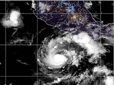 Hurricane Trudy approaches Mexico coast as Typhoon Champi threatens Guam