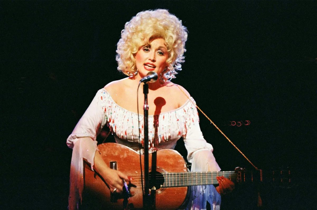 How the ‘backwoods Barbie’ Dolly Parton turned self-aware artifice into authentic artistry