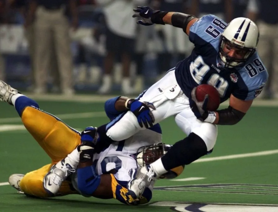 What is CTE, and how many former NFL players have been diagnosed with it?