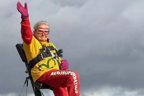 Woman, 99, takes to the skies to smash record for world's oldest wing-walker