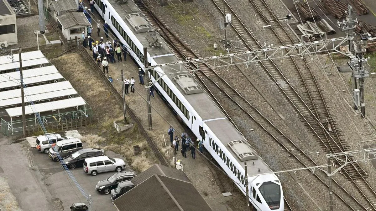 Express train hits and kills four workers in Japan