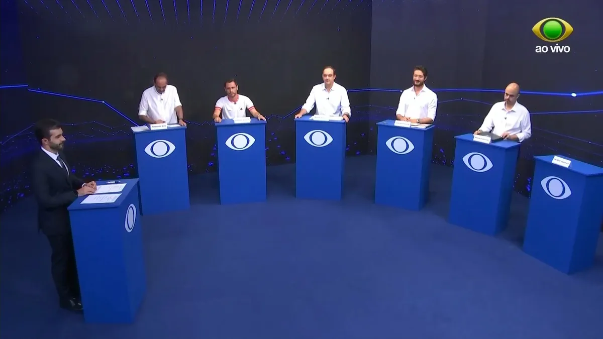 Candidatos ao governo de MG fazem 1º debate e discutem Propag, feminicídio, privatização, blitz de IPVA e terras raras