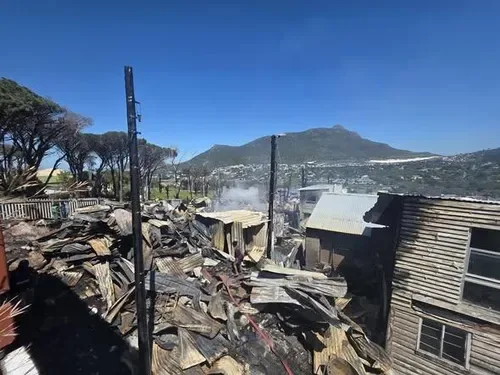 Firefighters battle blaze in Imizamo Yethu as residents call for housing action