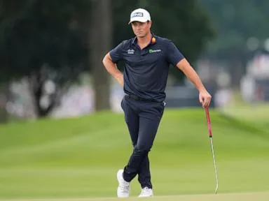 Hovland surges to a 1-shot lead at Tour Championship with cast of challengers lined up behind him