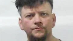 Man who murdered stepmother's ex and ate finger jailed for life