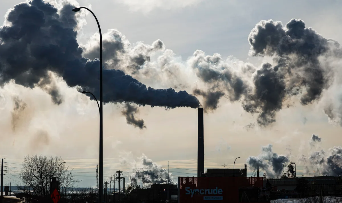 Alberta’s $2-billion surplus could soften economic pain caused by trade war, minister says