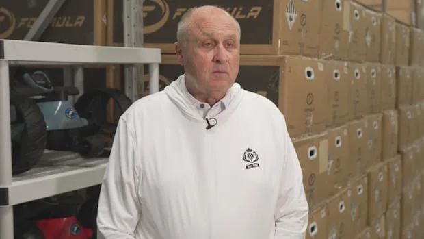He sells golf trolleys, not cars. But he’s facing a $183K bill under a federal Chinese EV tariff