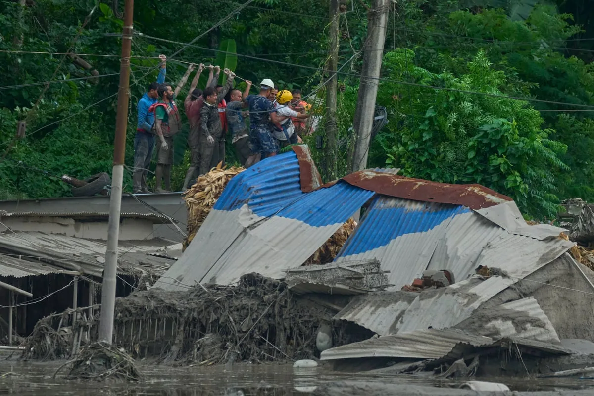 Rescuers urged to remain on high alert after dam bursts banks again in Nepal