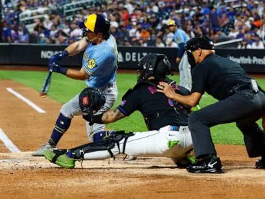 Brewers overcome Dustin May's early injury to rout the Mets 8-1
