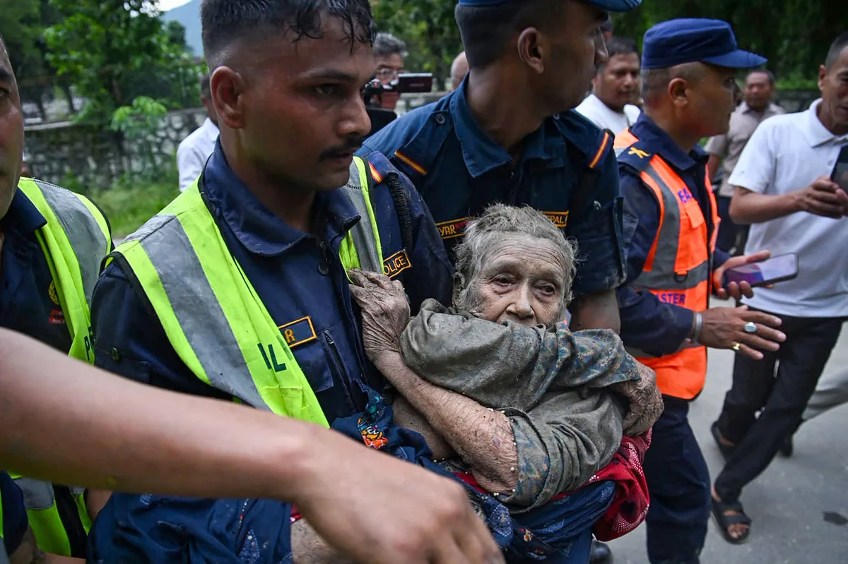 Videos show crushing walls of water overtake buildings and bridges on Nepal-Tibet border