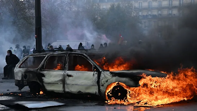 Police clash with protestors in France as tens of thousands rally over cost of living