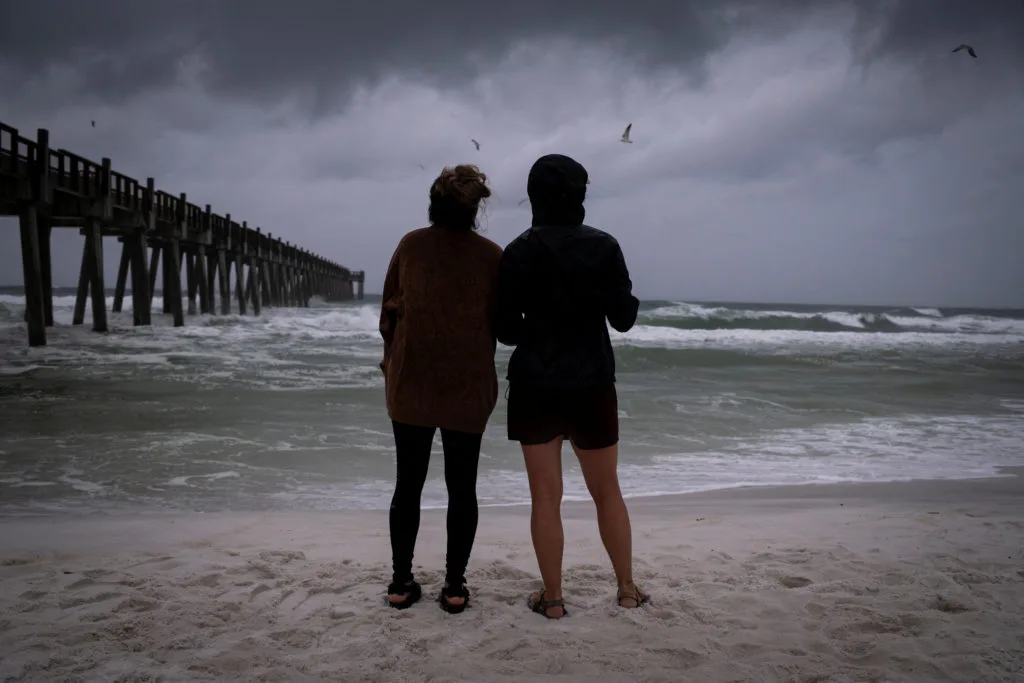 El Niño's storm-killer winds and climate's warming waters in fight over future of Hurricane Isaias