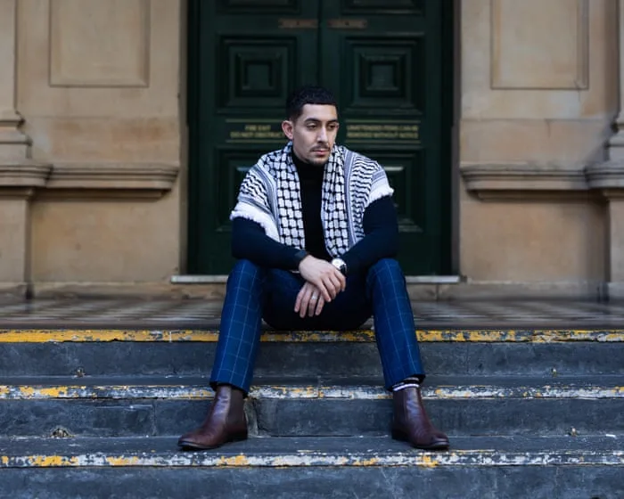 Palestinian Australian sues NSW police claiming he was punched at Herzog rally when helping prayer group