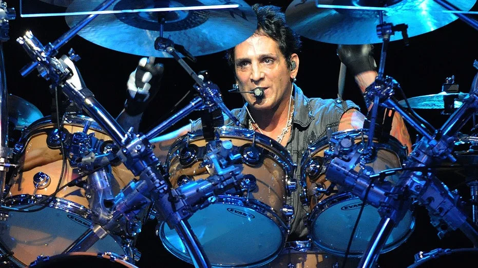 Journey drummer rushed to hospital after medical emergency interrupts concert