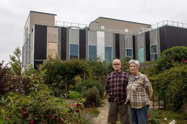 'Our homes are dwarfed by hospital that looks like a giant cigarette bin'