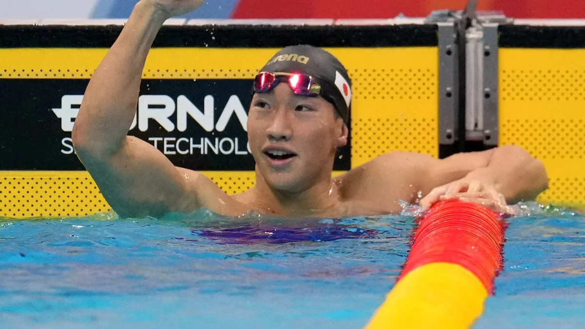 Shin Ohashi of Japan sets world record in 200-meter breaststroke at the Asian Games