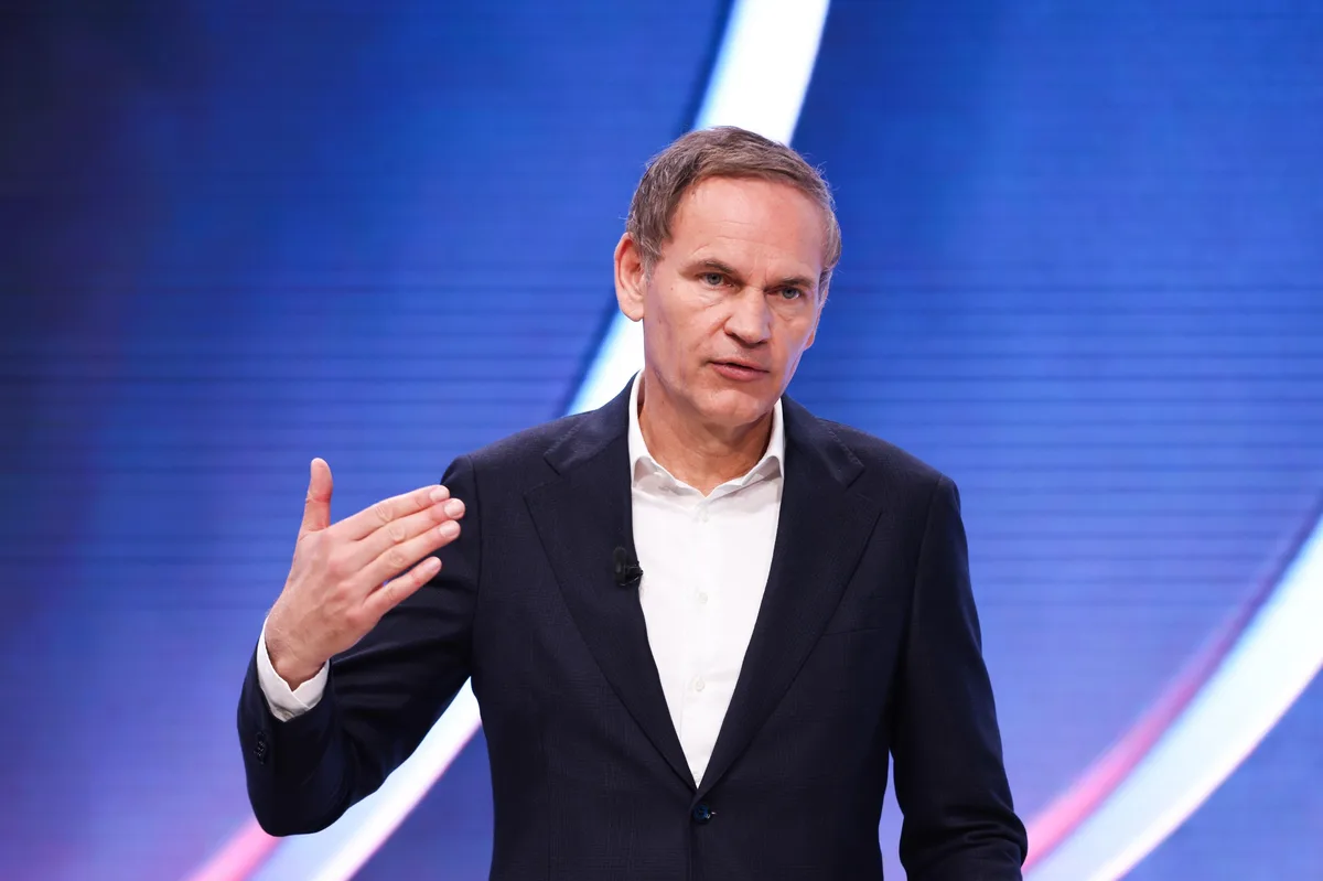 Volkswagen CEO faces workers angry over his plan to cut 100,000 jobs