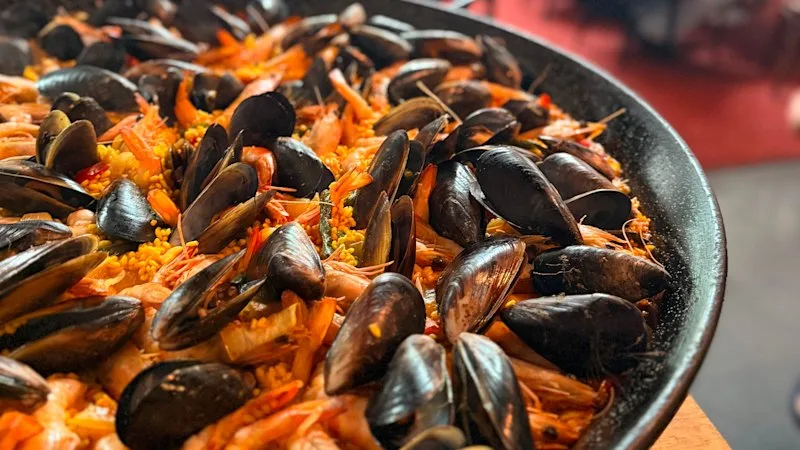 Celebrate 20 years of this hatted CBD diner with paella and tapas at Prahran Market