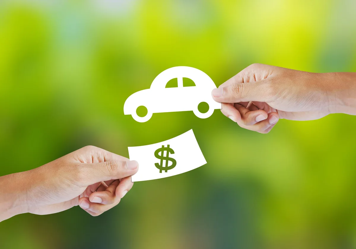 Should I sell my car myself for more money or trade it in at the dealer?