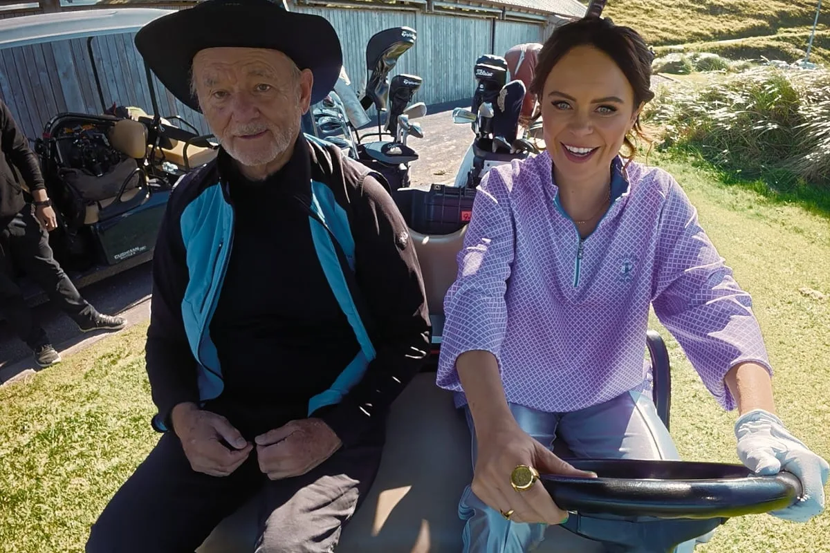 Joanne McNally drives Bill Murray in a golf cart on his Ireland road trip show