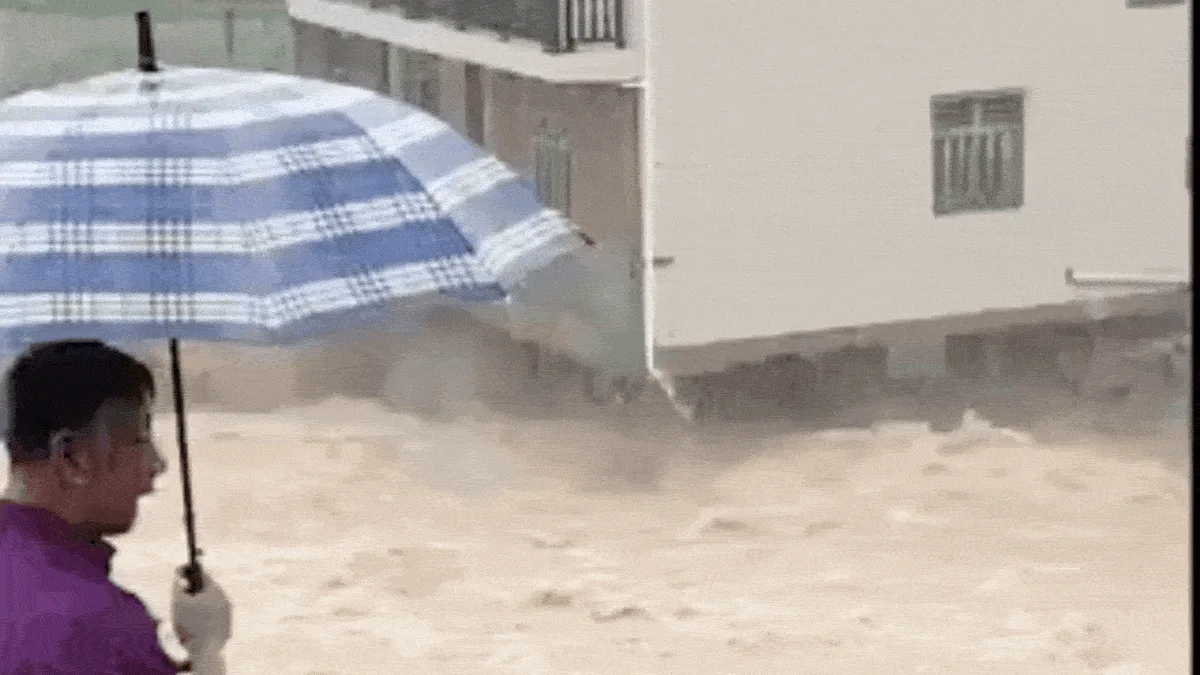 Watch: Flash floods in China destroys 3-storey building; 2500 stranded inside school