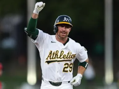 Walton homers and Bolte has 4 hits to lead the Athletics to a 7-3 victory over the Angels