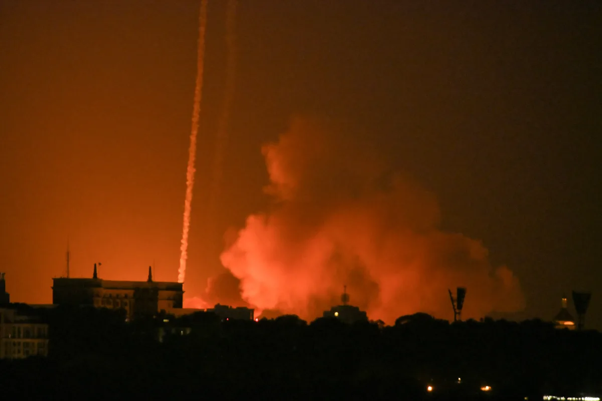 Russia launches ballistic missile attack on Kyiv, killing at least three, officials say
