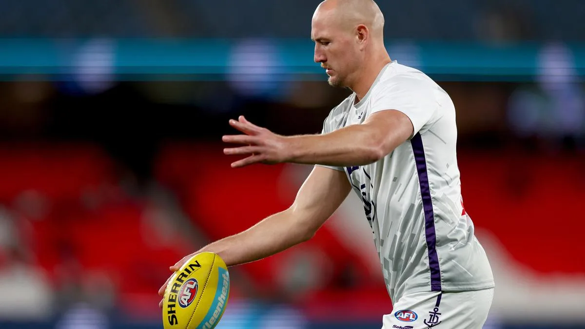 Fremantle Dockers defender Brennan Cox sustains calf injury against Carlton