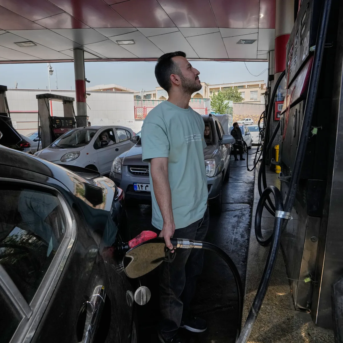 Long Lines for Gas in Iran Show War and U.S. Blockade Squeezing Supply