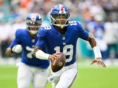 Jameis Winston runs for a touchdown in the Giants' 26-3 preseason win over the Dolphins