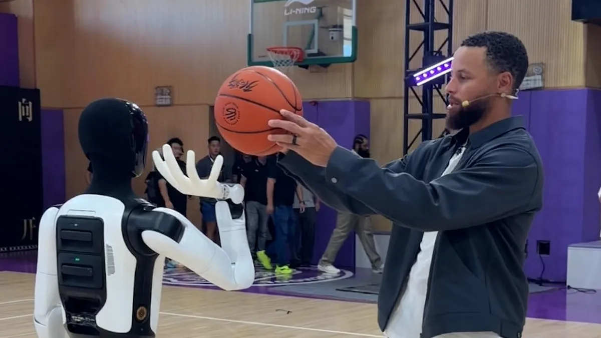 Steph Curry shoots hoops with robots in China