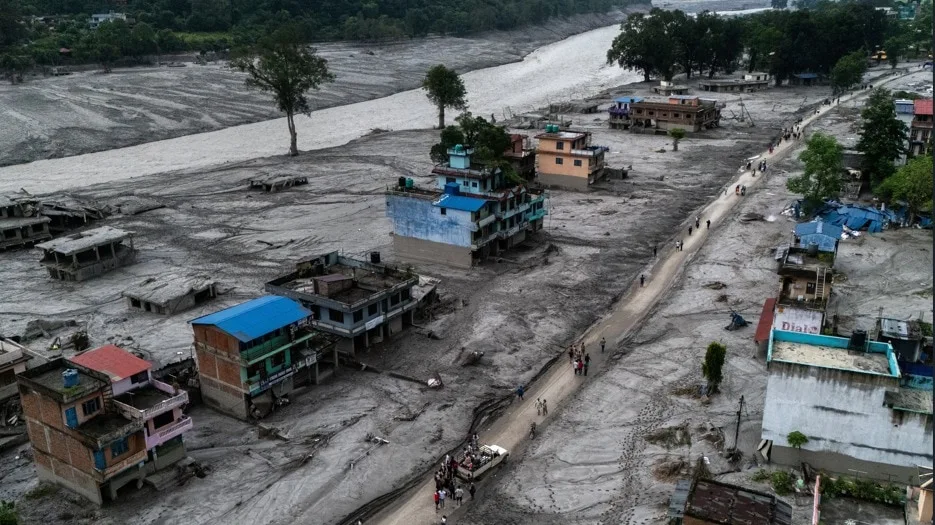 Nepal rescuers battle mud, debris in race to find survivors as toll nears 700