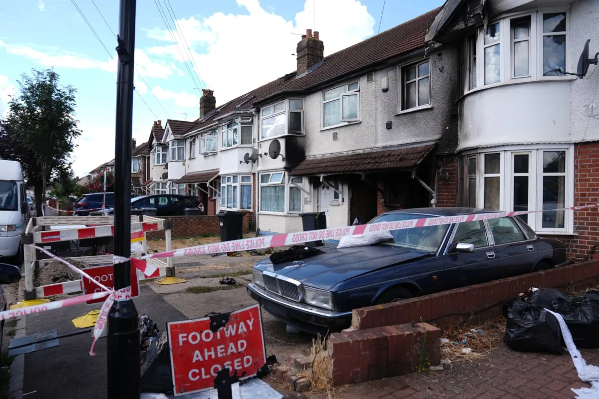 Man charged with murder after woman killed and eight injured in London house fire
