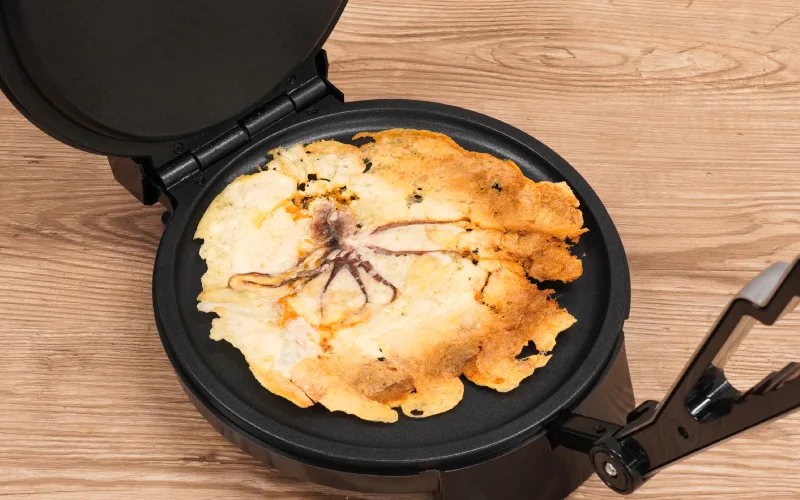 Turn octopus, spaghetti, and more of your favorite foods into crackers with Senbei Maker 2