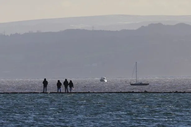 Body of man washes up on Merseyside rocks as police say death 'unexplained'