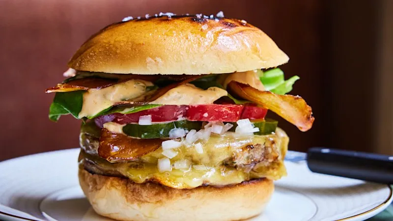 Josh Niland says a double cheeseburger is his signature dish. This is how to make it