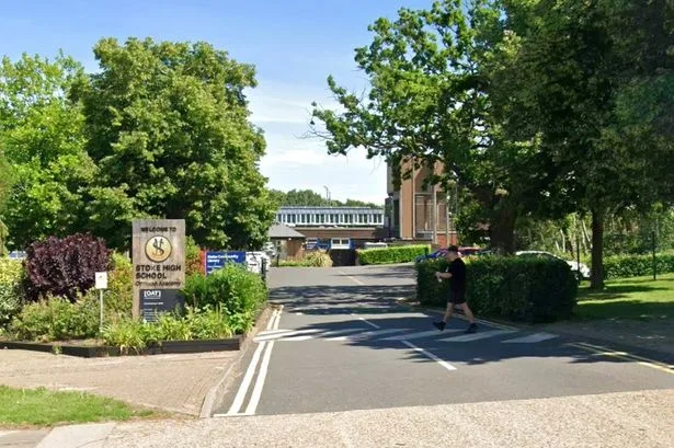 Ipswich high school evacuated and police swarm scene after 'malicious' message