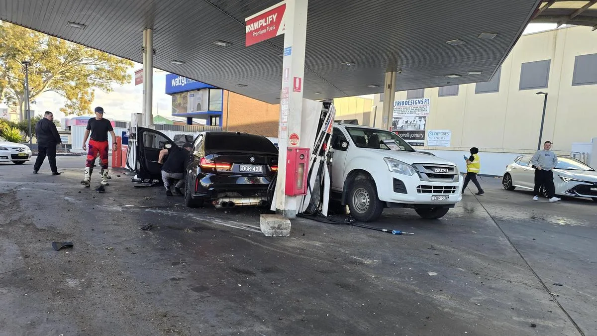 Pedestrian lucky to be alive after BMW M3 goes sideways into a petrol bowser