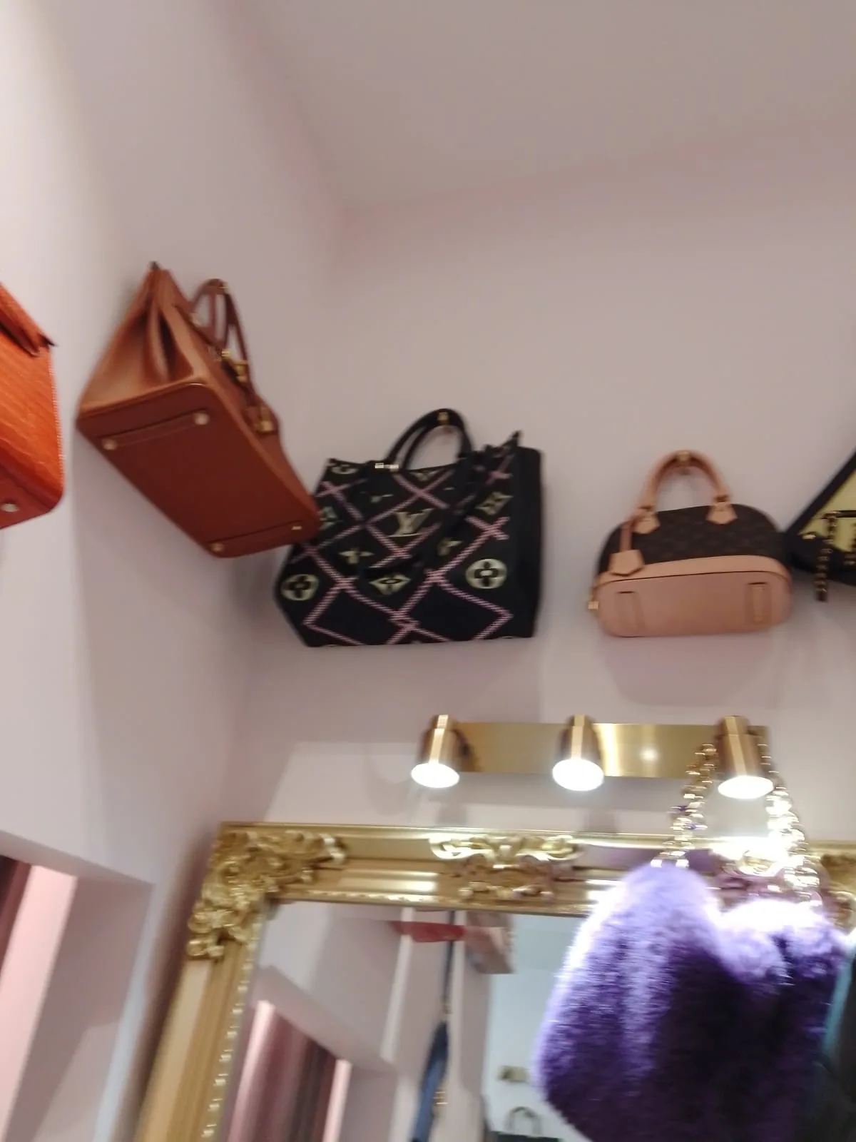 Boutique flogging fake Chanel, Dior and Louis Vuitton on upmarket west London street ordered to pay huge fine