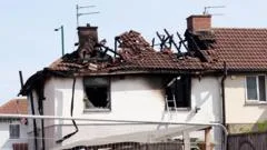 Murder probe as two people dead in house fire