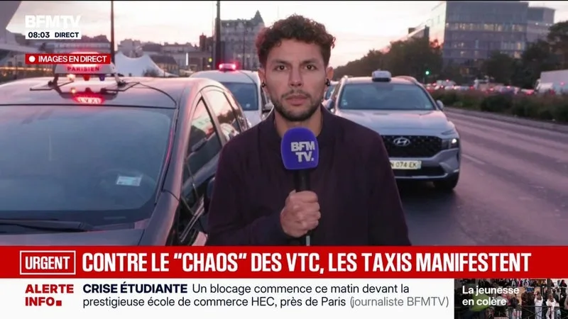 Les taxis manifestent à Paris contre la concurrence des VTC et la hausse du prix du carburant