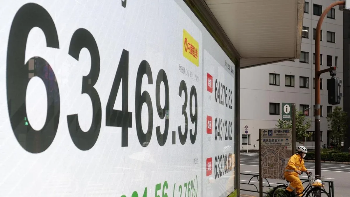 Shares slip in Asia as oil climbs, rate hikes loom