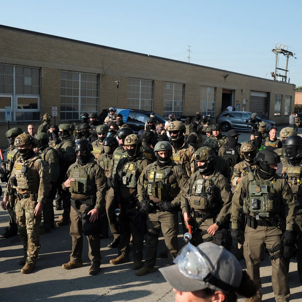 ICE Agent Who Pushed Activist to the Ground Near Chicago Pleads Guilty