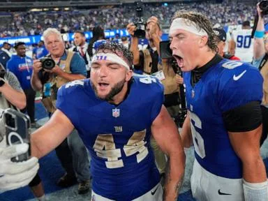 Giants' offense rolls over the Cowboys to give coach John Harbaugh a 28-20 win in his debut