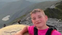 'Superhero' boy, 9, with amputated foot completes Three Peaks Challenge in under 24 hours