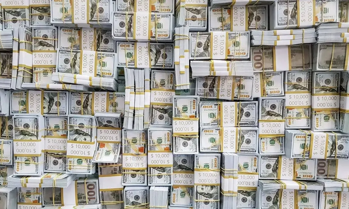 Dólar cai a R$ 5,14 com alívio no mercado externo