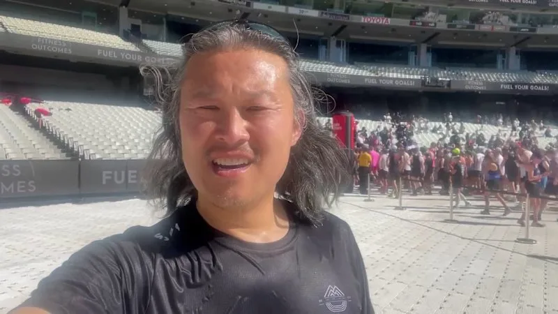 Andrew Wu runs the Melbourne Marathon