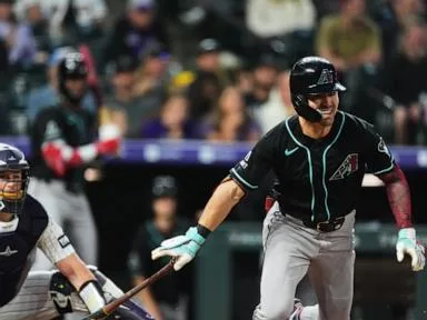 Diamondbacks beat the Rockies 5-3 to keep NL wild-card hopes alive