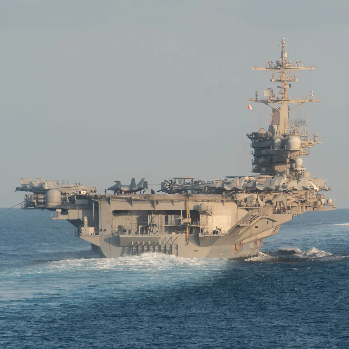 Top Admiral Praises Sailors but Concedes Hardships After Visit to U.S.S. Lincoln